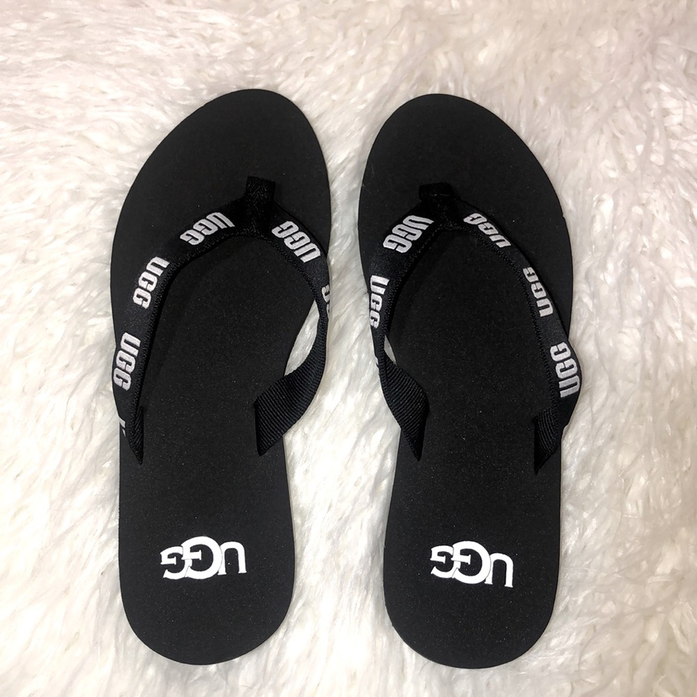 black UGG flip flops
